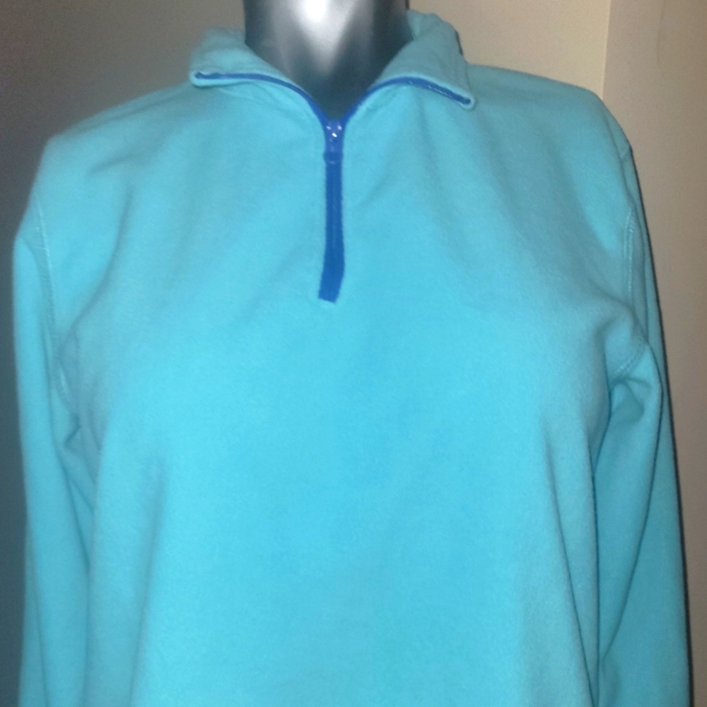 Girl size extra large fleece teal and bright blue with zipper at the neck